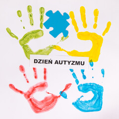 Kids handprint made of paint and polish inscription Autism Day. Autism Spectrum Disorder. Autism...