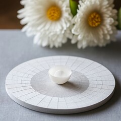 White Paper Bowl on Textured Circular Tray with Paper Flowers