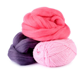 Felting wool and knitting yarn isolated on white