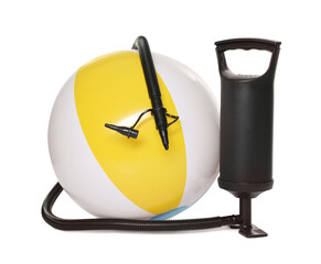 Inflatable ball and manual air pump isolated on white