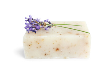 Soap bar and lavender flowers isolated on white