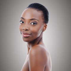 Skincare, dermatology and portrait of black woman in studio with smile, natural makeup or facial...