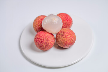 Fresh lychee and peeled lychee pulp