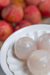 Fresh lychee and peeled lychee pulp
