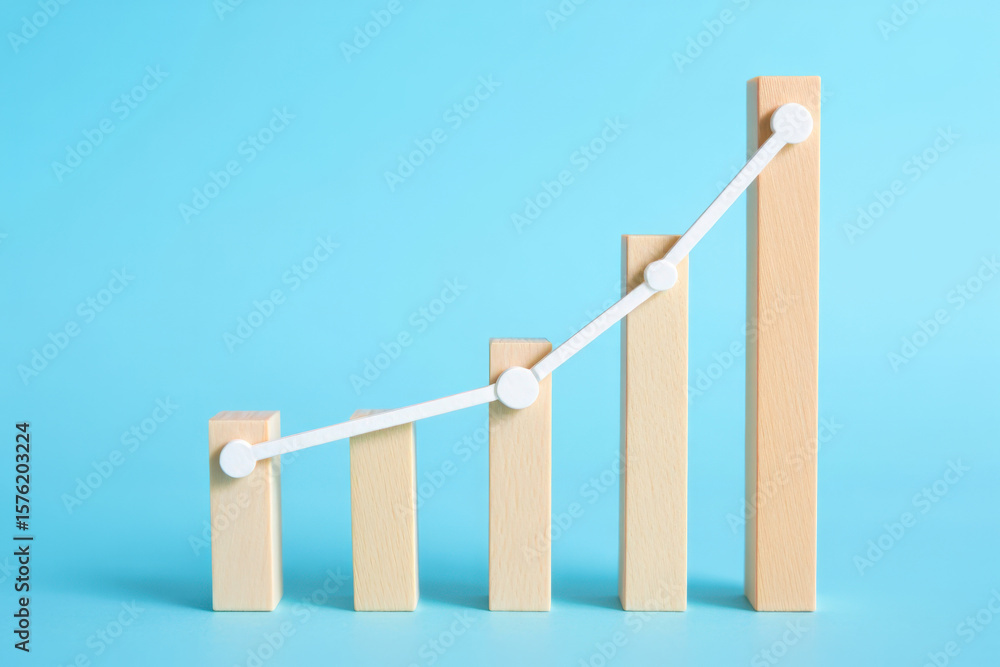 Poster ascending wooden blocks graph with white line on blue background depicting growth and progress in bu