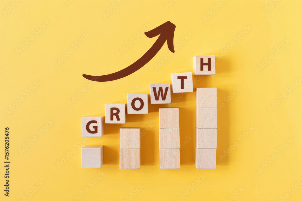 Poster building blocks of growth a stacked arrangement of wooden blocks spelling out growth with an upward 