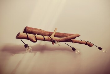 cozy rustic log chandelier with bulbs