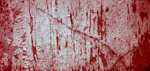 Fototapeta premium Cracked red background, scary bloody wall. white wall with blood splatter for halloween background. Horror background