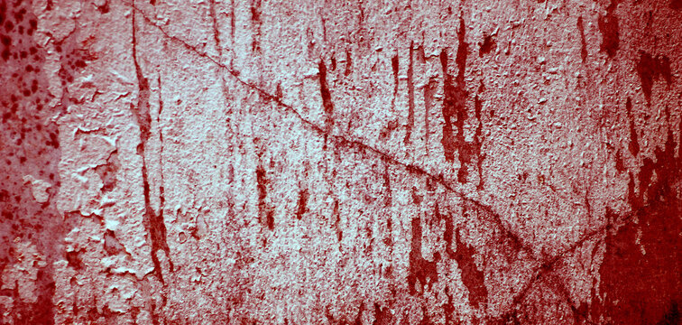 Cracked red background, scary bloody wall. white wall with blood splatter for halloween background. Horror background
