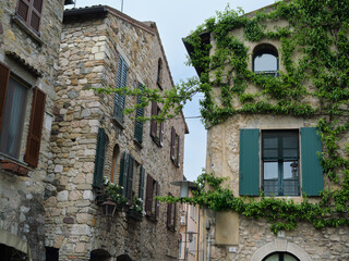 Sirmione Street With Narrow Alley Between Ancient Stone Buildings