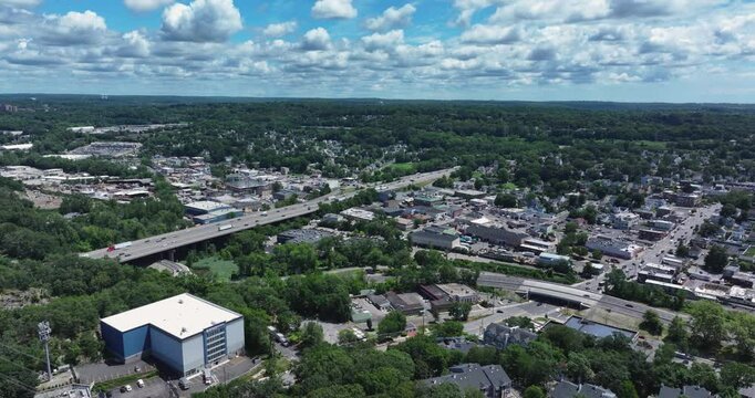 Elmsford, NY, US - July 9, 2025.  Afternoon aerial video over the Elmsford, NY, local commercial buildings and Interstate 87 and 287