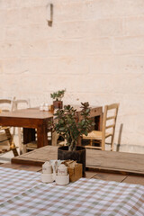 table and chairs on terrace, aesthetic countryside italian vibe