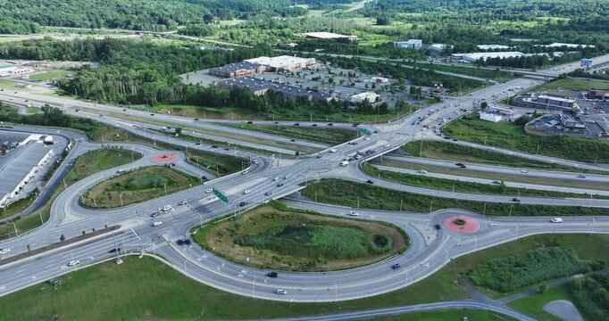 Aerial, drone, afternoon video of a diverging diamond interchange (DDI), located in Woodbury, NY