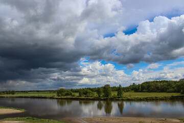 Brok, dark storm clouds over the Bug River, Masovian Voivodeship, Poland
