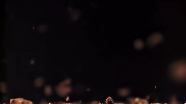 chocolate crumbs falling in the air