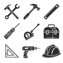 Obraz premium Collection of essential construction and repair tools including hammer screwdriver saw and safety helmet for building and maintenance work