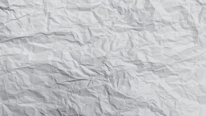 Crumpled white paper texture background with wavy surface. Crumpled white vintage paper surface texture for background. Wrinkled paper, abstract background. Paper background with copy space for text.
