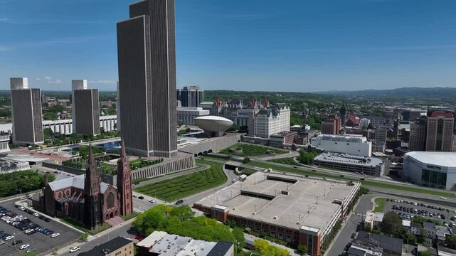 Albany, NY city skyline with aerial drone views from Lincoln Park showing state capitol government buildings beautiful architecture against blue sky with sunshine