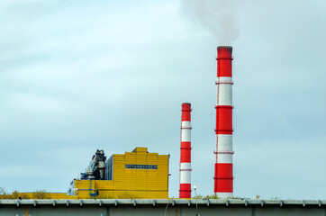 Industrial Factory with Two Tall Red Chimneys
