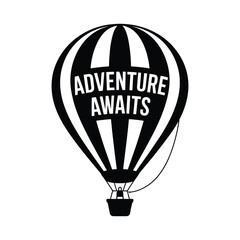 Naklejka premium Black hot air balloon with adventure awaits text silhouette isolated on white background
