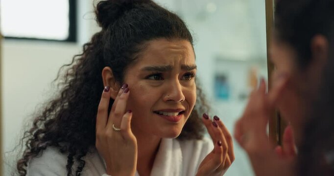 Frustrated woman, mirror or disaster with skin for acne, spots or imperfect in bathroom of home. Upset, female person or trouble with reflection for skincare fail, bad product or poor result in house