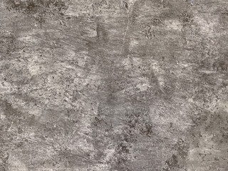 Decorative grey textured paint on a surface. Rough precast grey concrete washed paint with random...