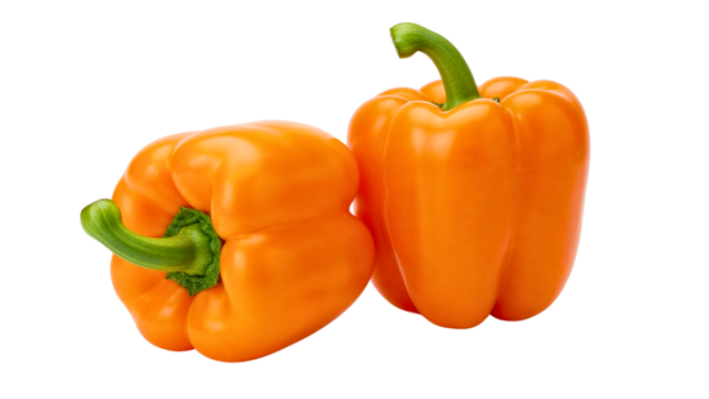 Two Fresh Orange Bell Peppers Isolated on White
