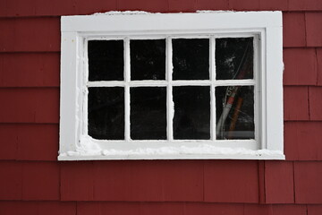 barn window in snow