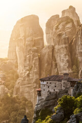 Rousanou (St. Barbara) Monastery at sunset, resting on a steep rock pillar in the UNESCO World Heritage site of Meteora, Greece