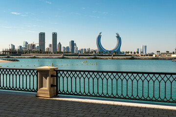 Doha, Qatar, Pearl Island and luxury hotel in the shape of a crescent moon © diy13