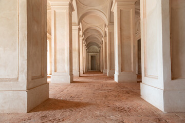 Clean long corridor perspective. Antique building, classic columns, minimalist interior.