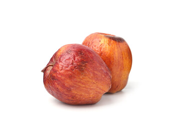 Two whole rotten apples isolated on white