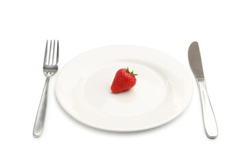 Plate with fresh strawberry and cutlery isolated on white