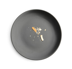 Dirty plate with bread crumbs isolated on white, top view