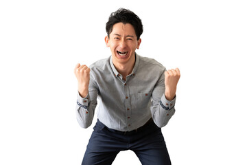 ガッツポーズをする笑顔の男性ビジネスマン