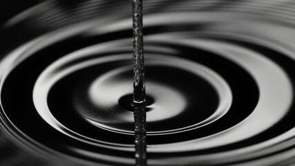 Abstract black and white liquid ripples