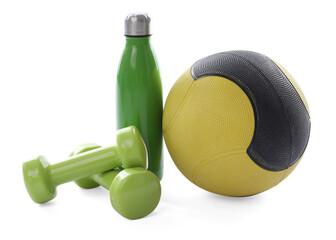 Medicine ball, dumbbells and water bottle isolated on white
