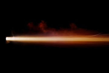 A shot from a firearm on a black background