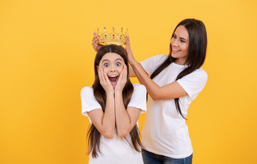 Every girl is a princess for mother. A queen and her little princess. Fairy tales family. Crowns...