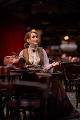 beautiful woman scientist in retro style with smoking pipe