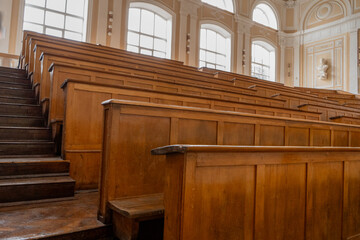 Empty Lecture Hall with Wooden Seats. Education in University
