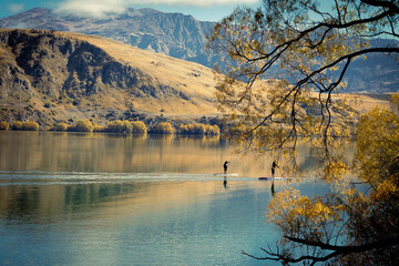 Lake Wakatipu, Queenstown, New Zealand – Paddle Boarders on a Calm Autumn Day