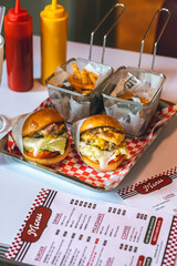 Classic Diner Cheeseburgers with Fries and Drinks