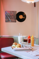 Classic Diner Cheeseburgers with Fries and Drinks