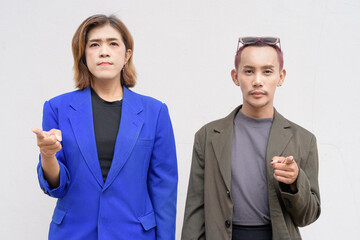 Gender inclusive business team couple against white background