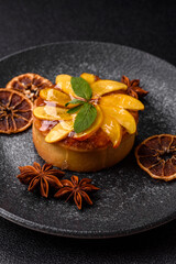 Sweet round pie or tart with apples and peach. Mini sweet tart