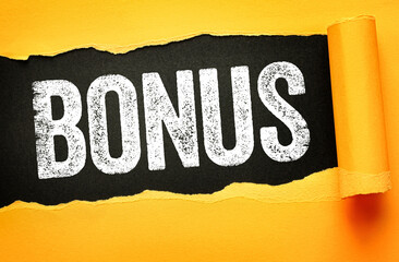 BONUS written in bold, distressed white letters on a torn black background revealed through bright...