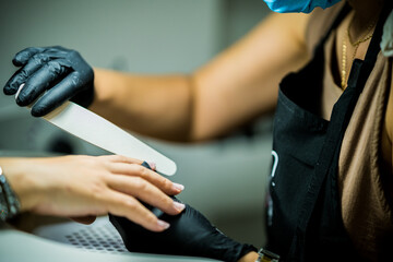Professional Manicure Process at Modern Beauty Salon
