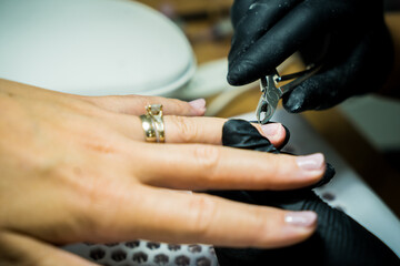 Fototapeta premium Professional Manicure Process at Modern Beauty Salon