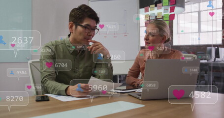 Coworkers in business attire reviewing documents at boardroom with social media metrics overlays